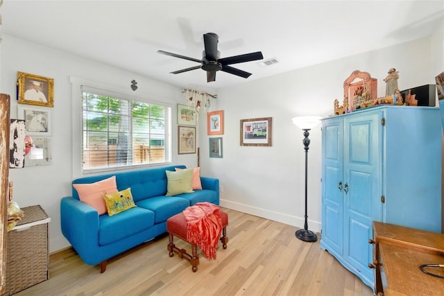 2406 Shiloh Dr, Austin, TX 78745 - sitting room featuring light wood-style floors, a ceiling fan, and baseboards