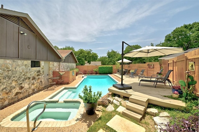 2406 Shiloh Dr, Austin, TX 78745 - view of pool with a deck, an in-ground hot tub, and a fenced backyard