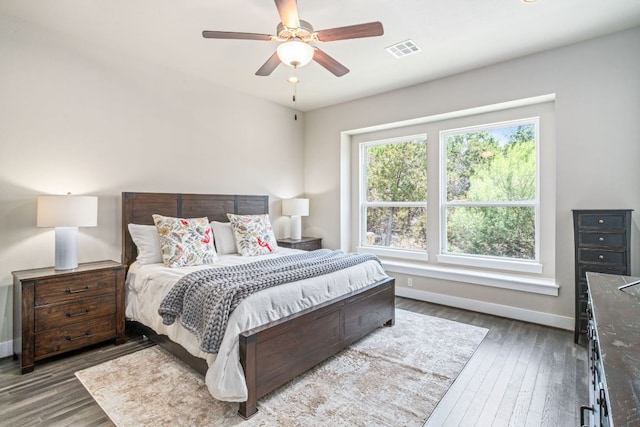 1280 Lucca Dr, Dripping Springs, TX 78620 - bedroom featuring baseboards, wood finished floors, and a ceiling fan