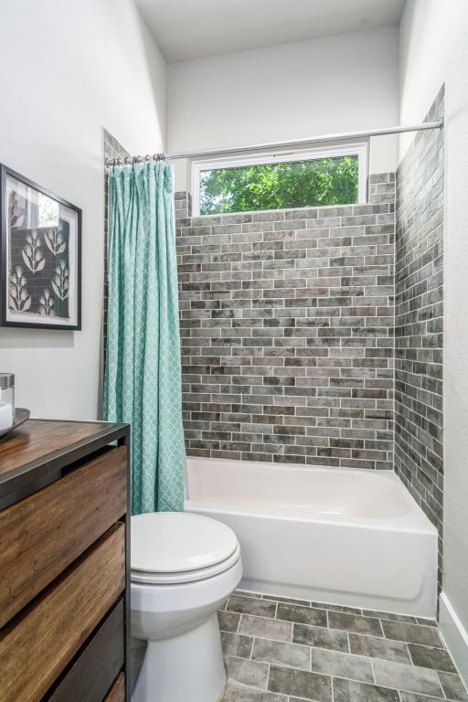 1280 Lucca Dr, Dripping Springs, TX 78620 - bathroom with shower / bath combo, toilet, and vanity