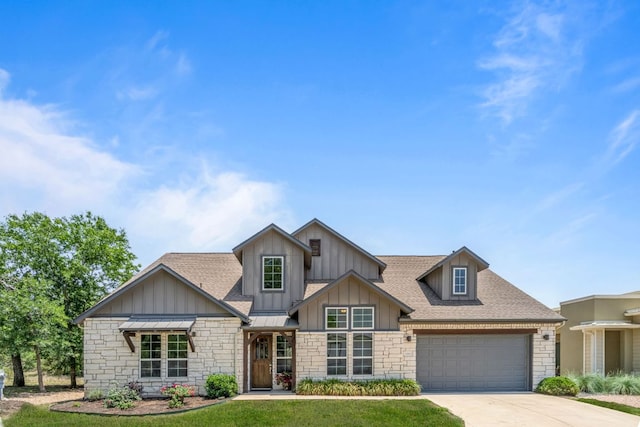 1280 Lucca Dr, Dripping Springs, TX 78620 - craftsman inspired home with stone siding, driveway, a garage, a shingled roof, and board and batten siding