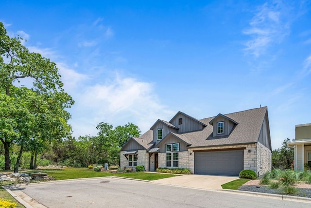 1280 Lucca Dr, Dripping Springs, TX 78620 - craftsman inspired home with stone siding, board and batten siding, concrete driveway, and a garage