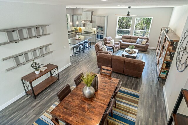 1280 Lucca Dr, Dripping Springs, TX 78620 - living area with a ceiling fan, baseboards, and wood finished floors