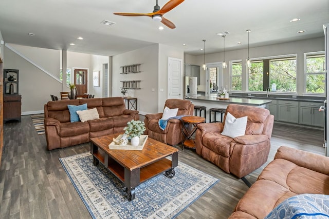 1280 Lucca Dr, Dripping Springs, TX 78620 - living room featuring recessed lighting, dark wood-type flooring, a ceiling fan, and baseboards