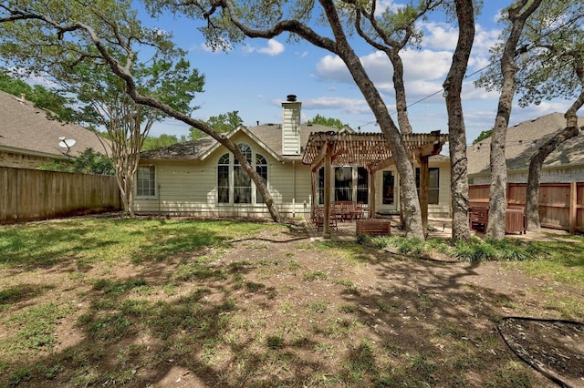 5405 Apache Creek Cv, Austin, TX 78735 - back of property with a pergola, a fenced backyard, a chimney, and a patio area