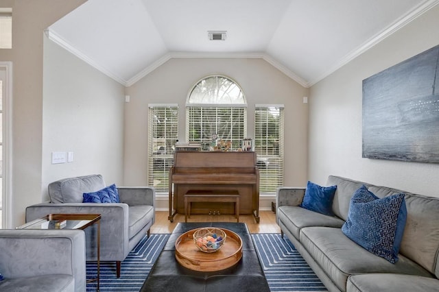 5405 Apache Creek Cv, Austin, TX 78735 - living room with wood finished floors, lofted ceiling, and crown molding