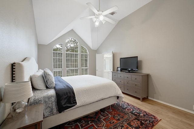 5405 Apache Creek Cv, Austin, TX 78735 - bedroom featuring light wood-style flooring, vaulted ceiling, baseboards, and a ceiling fan