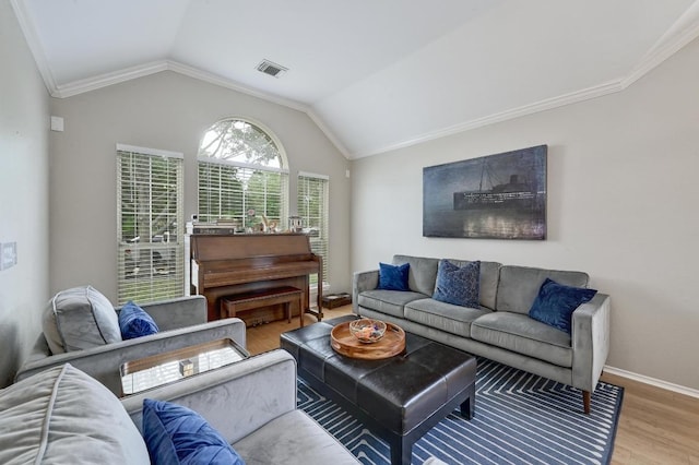 5405 Apache Creek Cv, Austin, TX 78735 - living area featuring wood finished floors, lofted ceiling, and crown molding
