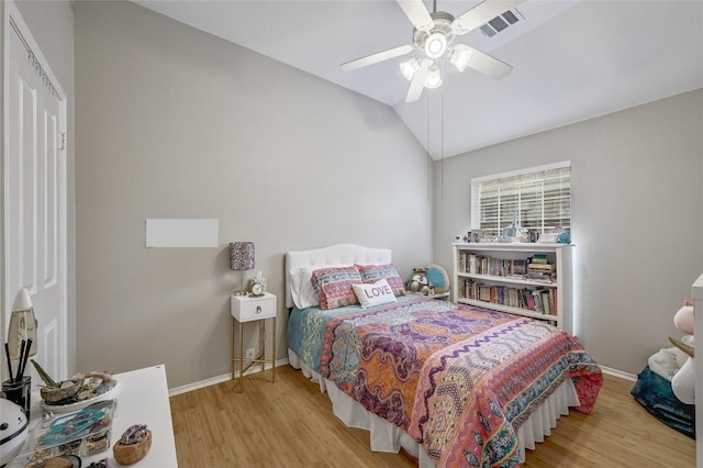 5405 Apache Creek Cv, Austin, TX 78735 - bedroom with wood finished floors, lofted ceiling, baseboards, and a ceiling fan