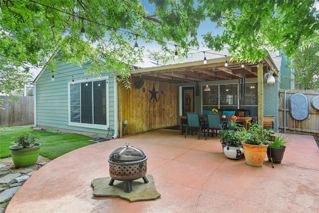 17008 Cactus Blossom Dr, Pflugerville, TX 78660 - fenced backyard featuring a fire pit and a patio area