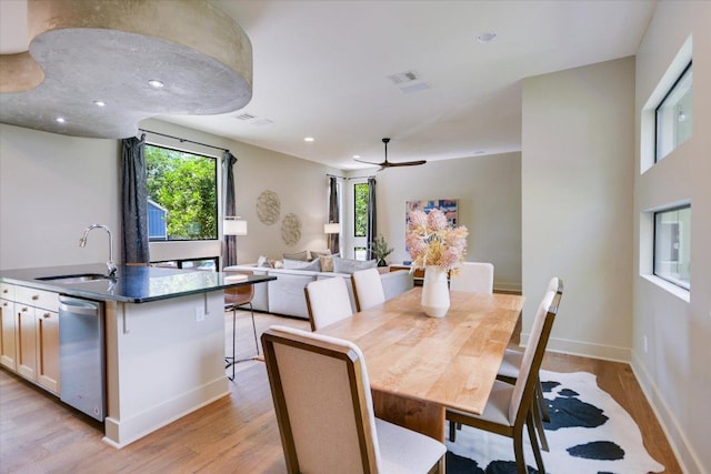 1904 E 9th St, Austin, TX 78702 - dining space featuring light wood-type flooring, baseboards, a ceiling fan, and recessed lighting