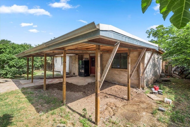 1307 Meadgreen Dr, Austin, TX 78758 - view of patio / terrace featuring a carport