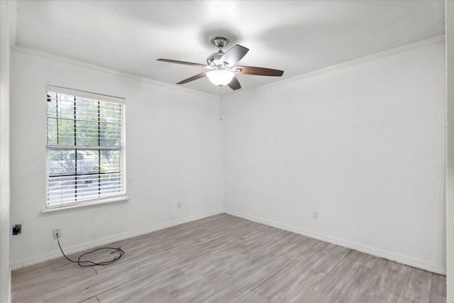 1307 Meadgreen Dr, Austin, TX 78758 - spare room featuring crown molding, light wood finished floors, ceiling fan, and baseboards