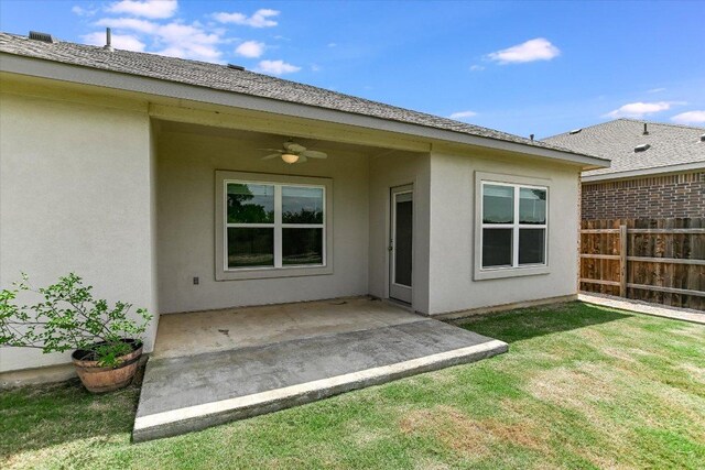 4333 Buffalo Ford Rd, Georgetown, TX 78628 - back of house with a ceiling fan, stucco siding, and a patio area