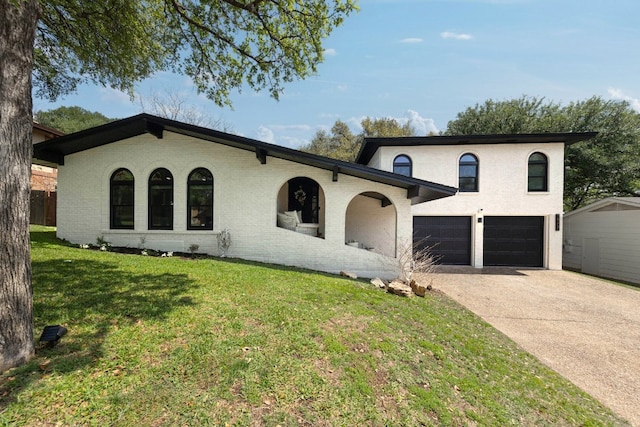 7905 Havenwood Dr, Austin, TX 78759 - view of front facade featuring a garage, concrete driveway, and a front lawn