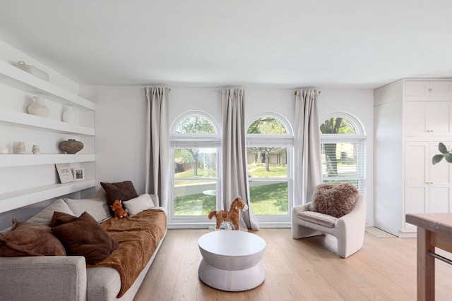 7905 Havenwood Dr, Austin, TX 78759 - living area with light wood-style floors and healthy amount of natural light