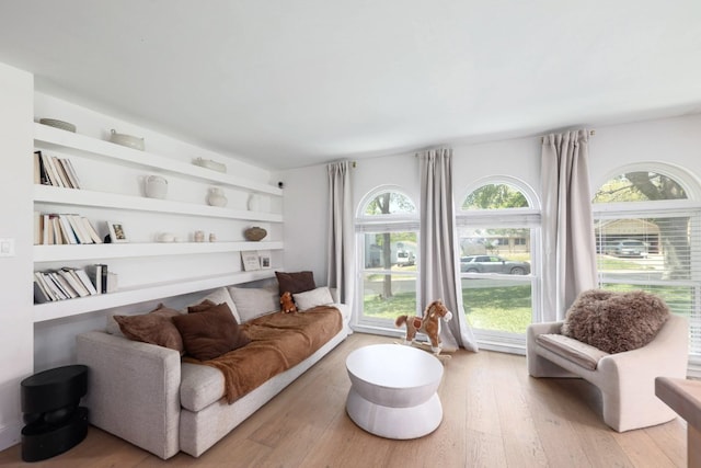 7905 Havenwood Dr, Austin, TX 78759 - living area with wood finished floors, plenty of natural light, and built in features