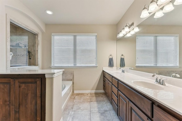 2415 Berkshire Way, Cedar Park, TX 78613 - bathroom with double vanity and a garden tub