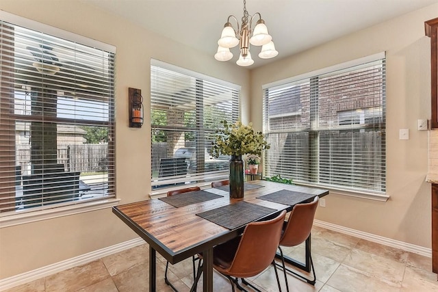 2415 Berkshire Way, Cedar Park, TX 78613 - dining space with a chandelier, plenty of natural light, and light tile patterned flooring