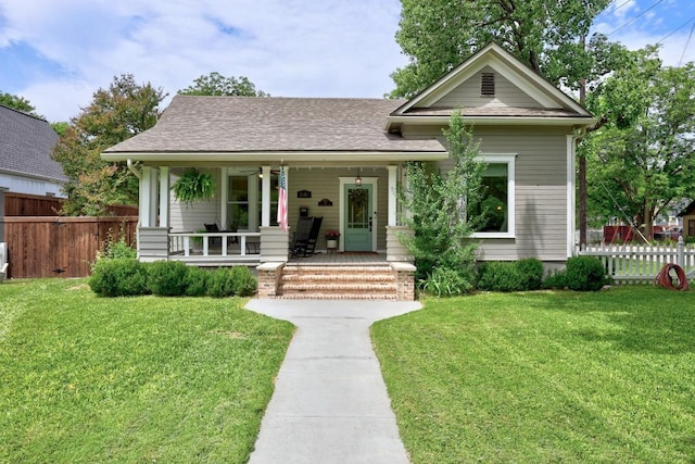 1502 S Elm St, Georgetown, TX 78626 - view of front of house featuring covered porch and roof with shingles