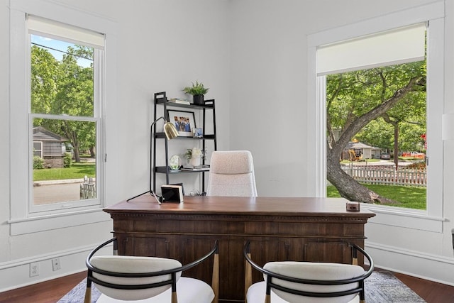 1502 S Elm St, Georgetown, TX 78626 - home office with dark wood-style flooring