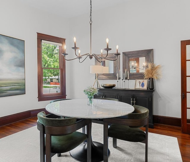1502 S Elm St, Georgetown, TX 78626 - dining area with a chandelier and dark wood finished floors