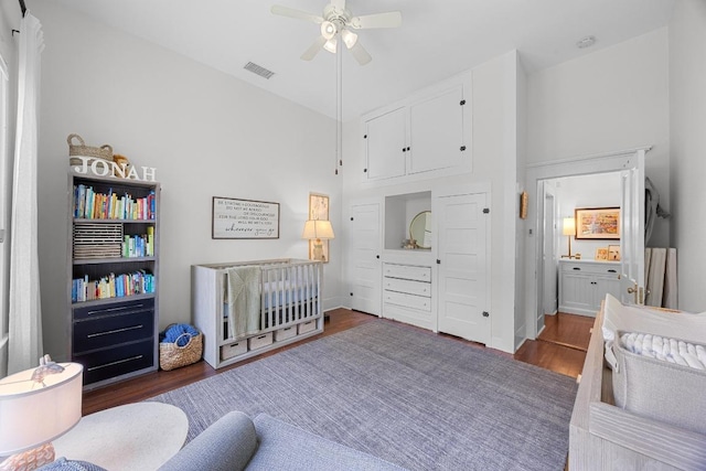 1502 S Elm St, Georgetown, TX 78626 - bedroom featuring wood finished floors and a ceiling fan
