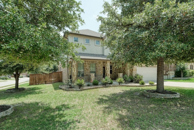 2937 Castellan Ln, Round Rock, TX 78665 - view of property hidden behind natural elements with stone siding, concrete driveway, a porch, and stucco siding