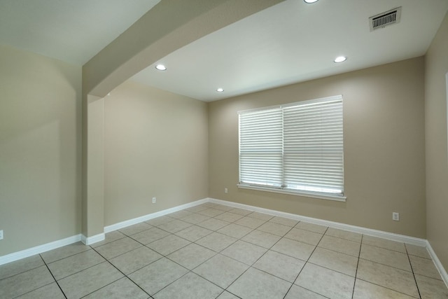 2937 Castellan Ln, Round Rock, TX 78665 - spare room with recessed lighting, light tile patterned floors, and arched walkways