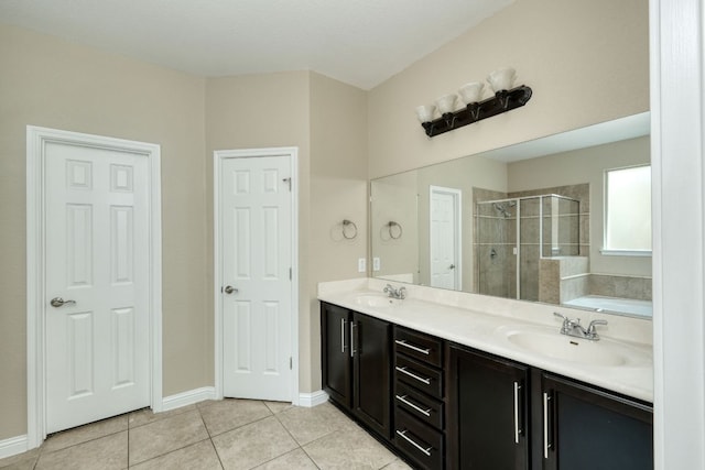 2937 Castellan Ln, Round Rock, TX 78665 - bathroom with a shower stall, tile patterned flooring, a bath, and double vanity