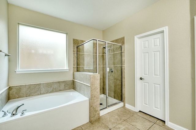 2937 Castellan Ln, Round Rock, TX 78665 - full bath featuring a bath, a stall shower, and tile patterned flooring