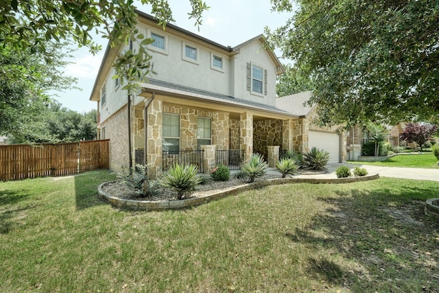 2937 Castellan Ln, Round Rock, TX 78665 - traditional home with stone siding, a porch, driveway, stucco siding, and an attached garage