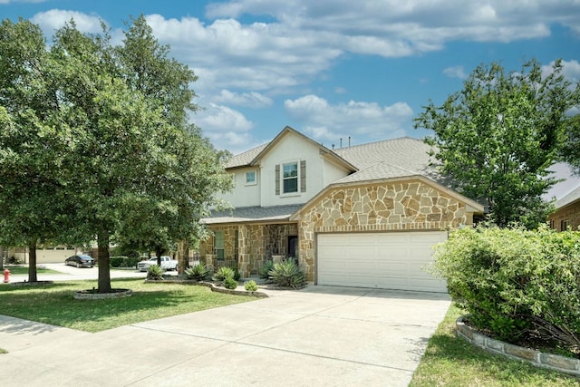 2937 Castellan Ln, Round Rock, TX 78665 - traditional-style home with stone siding, an attached garage, driveway, a front yard, and stucco siding