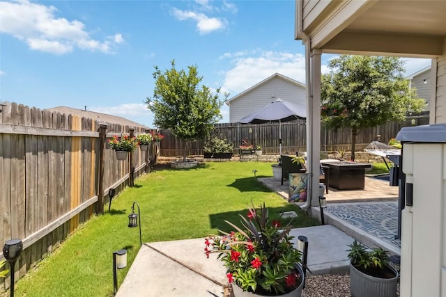 10901 Rome Ave, Austin, TX 78747 - fenced backyard featuring a fire pit and a patio