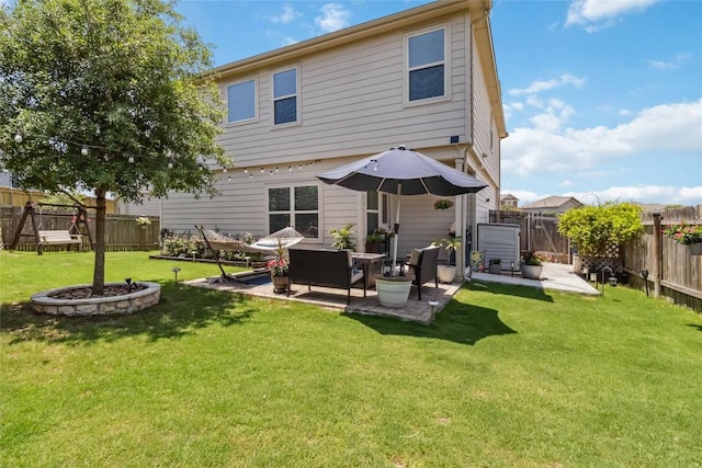 10901 Rome Ave, Austin, TX 78747 - back of house featuring a fenced backyard, a patio, and an outdoor hangout area