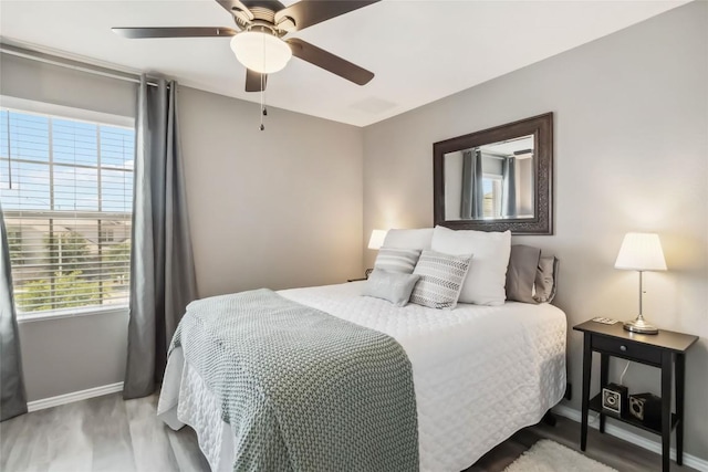 10901 Rome Ave, Austin, TX 78747 - bedroom featuring wood finished floors and a ceiling fan