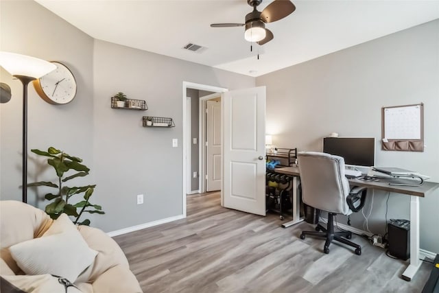 10901 Rome Ave, Austin, TX 78747 - home office featuring ceiling fan and wood finished floors
