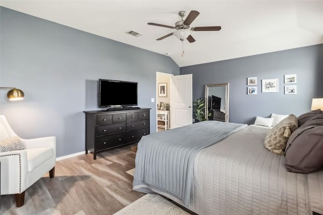 10901 Rome Ave, Austin, TX 78747 - bedroom featuring wood finished floors, vaulted ceiling, and ceiling fan