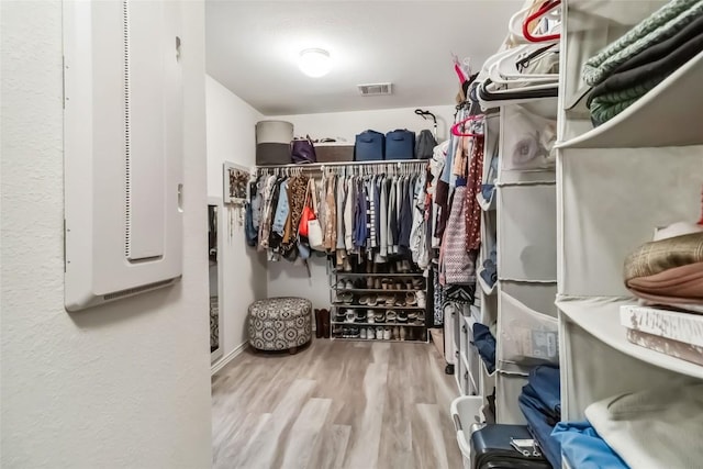10901 Rome Ave, Austin, TX 78747 - walk in closet with wood finished floors