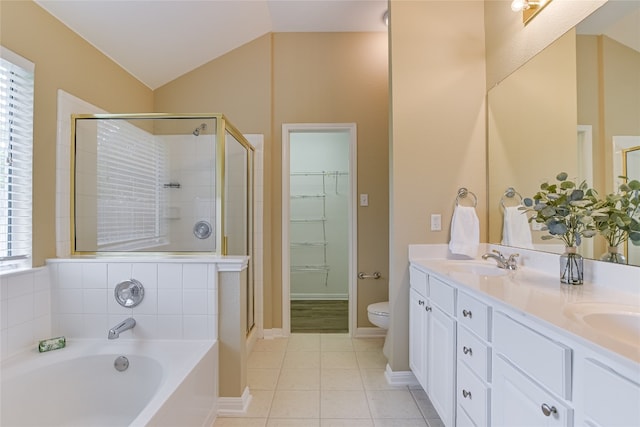 168 Hickory Ln, Georgetown, TX 78633 - bathroom with a shower stall, a garden tub, toilet, double vanity, and vaulted ceiling