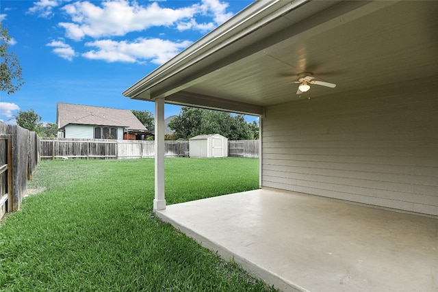 168 Hickory Ln, Georgetown, TX 78633 - fenced backyard with a storage unit, a ceiling fan, and a patio