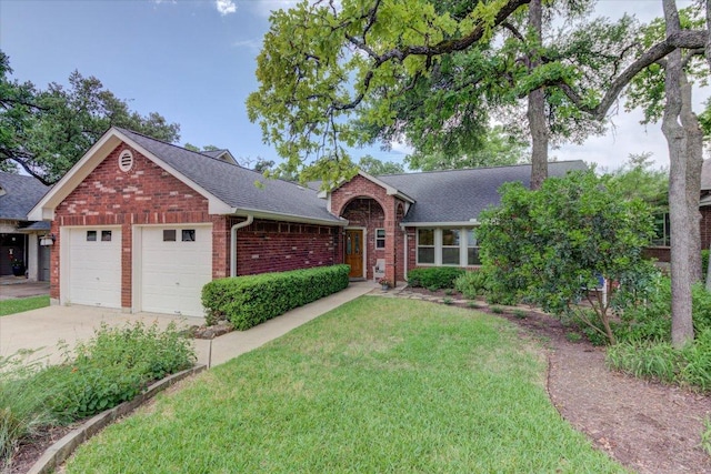 7925 Wheel Rim Cir, Austin, TX 78749 - view of front of property with roof with shingles, brick siding, an attached garage, driveway, and a front yard
