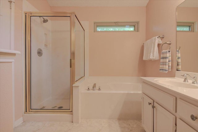 7925 Wheel Rim Cir, Austin, TX 78749 - full bath featuring a shower stall, a garden tub, and vanity