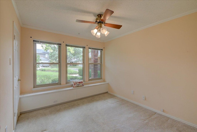 7925 Wheel Rim Cir, Austin, TX 78749 - spare room with a textured ceiling, light carpet, ceiling fan, ornamental molding, and baseboards