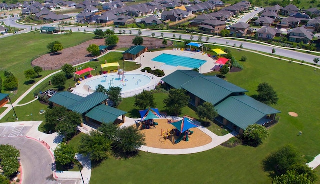 281 Twistleaf Dr, Buda, TX 78610 - aerial overview of property's location featuring a pool area and nearby suburban area