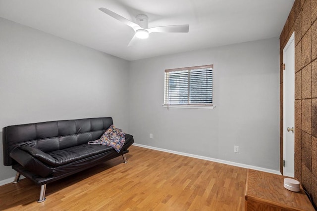 11505 Circle Bend Dr, Austin, TX 78758 - sitting room with light wood-style floors, a ceiling fan, and baseboards