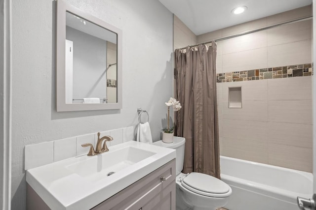 11505 Circle Bend Dr, Austin, TX 78758 - bathroom featuring toilet, vanity, and shower / bathtub combination with curtain