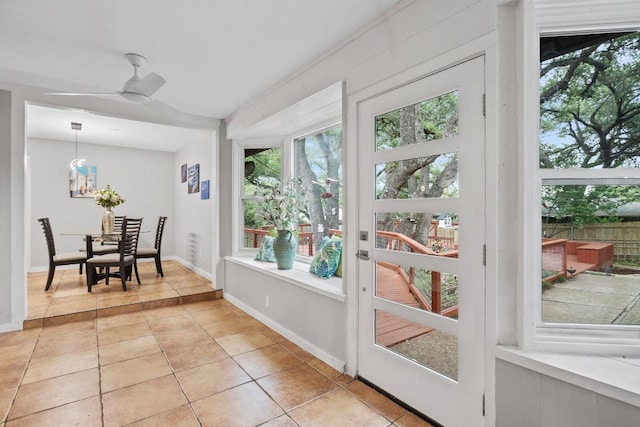 11505 Circle Bend Dr, Austin, TX 78758 - sunroom / solarium with tile patterned flooring and baseboards