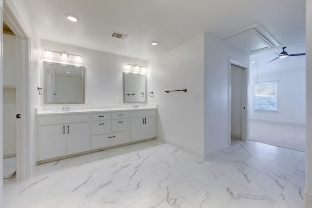 2105 Tiger Trl Unit 301, Round Rock, TX 78664 - full bathroom with double vanity, baseboards, recessed lighting, and marble finish floors