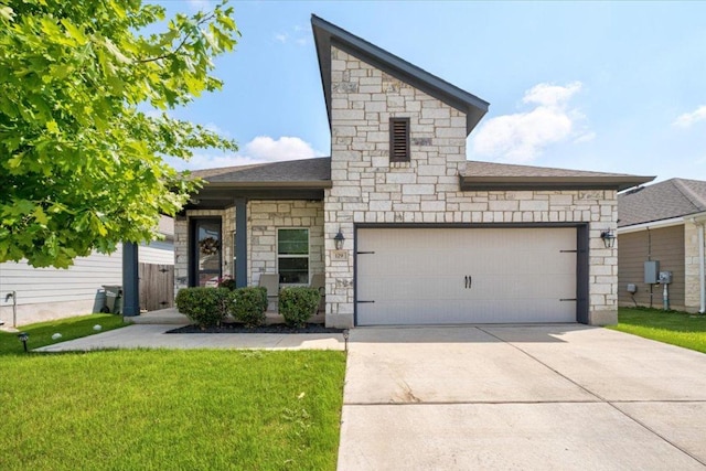 129 Lacey Oak Loop, San Marcos, TX 78666 - view of front facade featuring stone siding, driveway, a front yard, and a garage